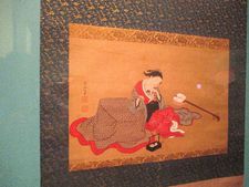 Beauty With A Kitten hanging scroll on silk, ca. 1716-36 - Nishikawa Sukenobu